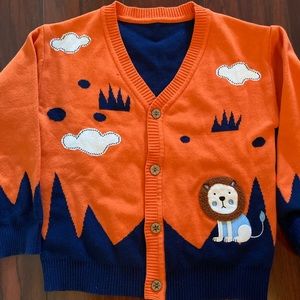 Brand new. Knitted kids cardigan